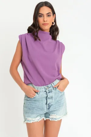 Blusa oversized sin mangas hombros plisados