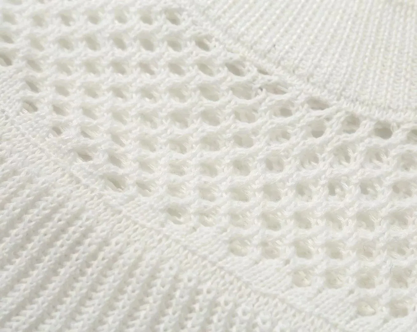 Splicing Hollow-out Flared Sleeve Knit Sweater