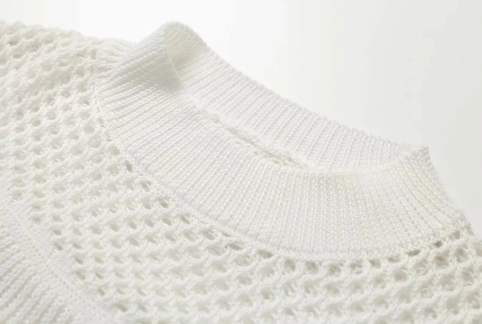 Splicing Hollow-out Flared Sleeve Knit Sweater